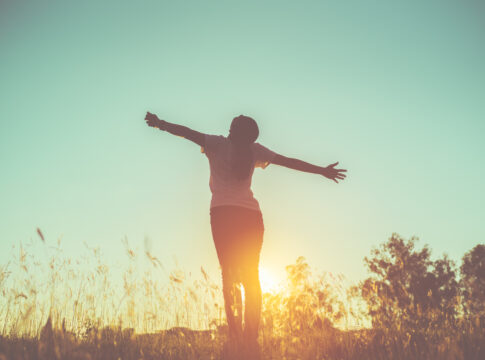 lifestyle concept - beautiful happy woman enjoying fresh air.