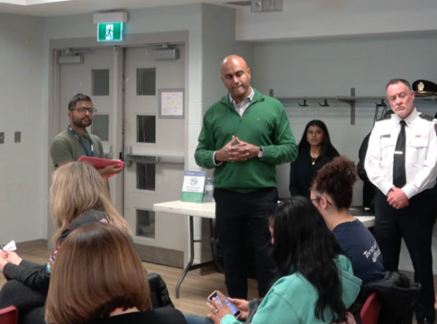 City Councillor Parthi Kandavel at a meeting