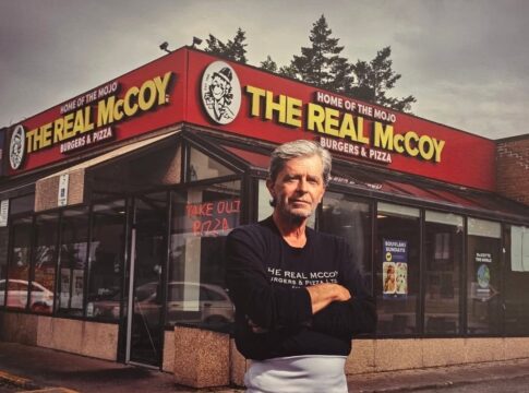 George Mihail in front of The Real McCoy original location on Markham Road.